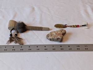 lot 221 image: Native-Themed Pipe, Quartz Rock, and Vintage Fishing Lure Set
