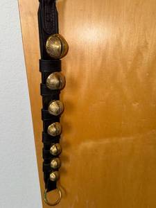 lot 141 image: Brass Bell Strap with Leather Band  7 Jingle Bells
