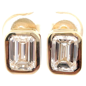 lot 17 image: 3 Carat Diamond Emerald Cut Solitaire Stud Earrings in 14k Yellow Gold Retail $4,495 VIDEO