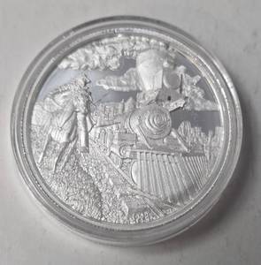 lot 7 image: 2 oz .999 Silver AG Round - Lawless Series - Train Robber - Airtite Case