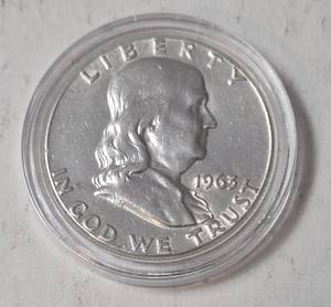 lot 77 image: 1963 Franklin Silver Half Dollar - Airtite - Unc.