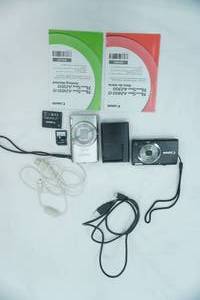 lot 43 image: Canon Powershot Cameras, Cords, Batteries (2), Charging Block, SD Cards (2), Manual