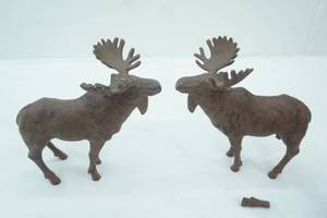 lot 53 image: Cast Iron Moose Figurines (2ct) (8 tall they have been repaired)
