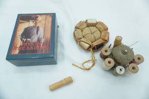lot 56 image: Vintage John Wayne Dresser Box, AntiqueVintage Pin Cushions and wooden Spools of thread