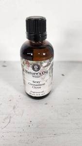 lot 47 image: Natures Oil Winter Sexy Cinnamon Clove Fragrance Oil 2 oz Bottle - Nearly Full