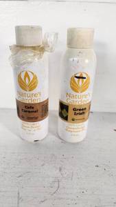 lot 64 image: Natures Garden Cafe Caramel and Green Irish Fragrance Oils - Cafe Caramel Nearly Empty, Green Irish Around 34 Full