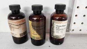 lot 66 image: Candlescience Fragrance Oils including Smoke and Odor Eliminator (Under Half Full), Mahogany Shea (Just over 12 full), Ocean Rose (Just over 12 Full)