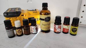 lot 88 image: Uplift, Holiday Season, Mystic Moment, Cinnimon and Other Small Bottles of Scents - All Less than 14 Full or with Drops Left, See Pics
