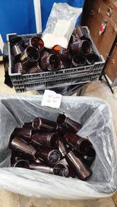 lot 114 image: Amber Plastic Jars with Lids and Seals (not counted) - 45 of the 3 ones, 42 of the 6 12 ones, very few of the very short ones