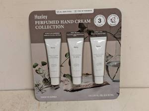 lot 92 image: NEW HUXLEY PERFUMED HAND CREAM COLLECTION 3PK