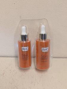 lot 203 image: ROC MULTI CORREXION REVIVE  GLOW DAILY SERUM 2PK