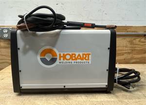 lot 203 image: Hobart Handler 125, 120V, 130 Amp, Flux Core Welder, MIG-Ready Welder, Model# 500573 Msrp $439.99