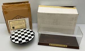 lot 88 image: NASCAR Checkered Flag Battery Operated Spinning Die Cast Car Display Base