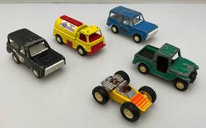 lot 104 image: Vintage Miniature Die Cast Tootsie Toy Cars And More