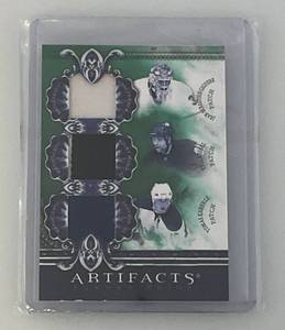 lot 197 image: Artifacts NHL 1840 Triple Patch Card Including Jean Sabastian Giguere, Phil Kessel And Tomas Kaberle (Doublke Sleeved)