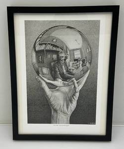 lot 230 image: Framed Behind Glass M.C. Escher Hand With Reflecting Globe Print 12 34 x 16 34