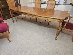 Elegant French Provincial Dining Table with Cane-Back Chairs