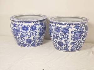 lot 44 image: Pair of Blue & White Chinoiserie Floral Porcelain Planters