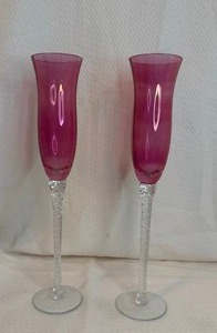 lot 215 image: Pink Art Glass Champagne Flutes with Twisted Stems Pair