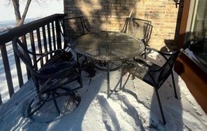 lot 26 image: Outdoor Patio Dining Set with Round Glass Top Table and Four Chairs