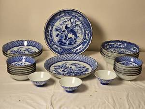 lot 138 image: Blue and White Floral and Peacock Bowl and Plate Collection by Queens - (24)