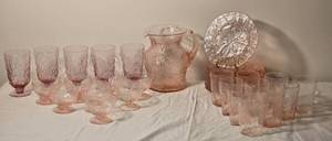 lot 31 image: Pink Depression Style Glass Tableware Collection with Pitcher and Plates