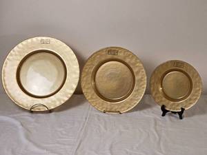 lot 70 image: Gold Tone Hammered Glass Decorative Plate Trio