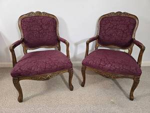 lot 23 image: Pair of Burgundy Upholstered Carved Wood Armchairs