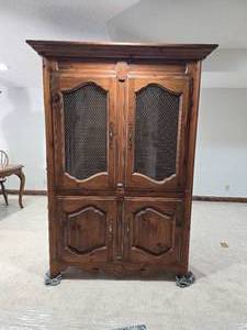 lot 3 image: Sheffield Manor Paneled Door Armoire Cabinet