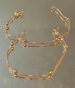 lot 83 image: 14K Yellow Gold Ball on Rope Bracelets  5g