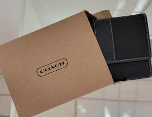 lot 29 image: Coach Black Signature Compact Clutch Wallet  NWB