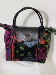 lot 32 image: Longchamp Le Pliage Velvet Handbag