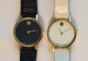 lot 71 image: Movado Museum Classic Black and White Wrist Watch Pair