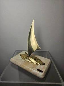 lot 168 image: Mid Century Bijan Brass Sailboat Sculpture on Faux Marble Base