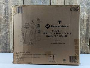 lot 3 image: Pre-Lit 12FT Halloween Inflatable Haunted House