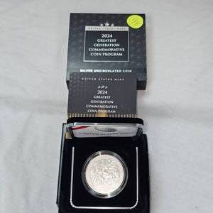 lot 98 image: 2024 US Mint WW II One Oz Silver Round