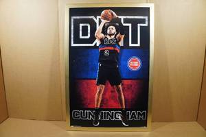 lot 91 image: Framed Cade Cunningham Poster - 34x22.4