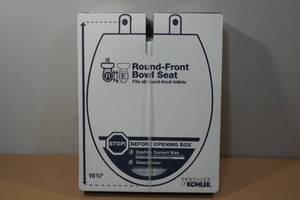 lot 217 image: Kohler Round Front Soft Close Toilet Seat