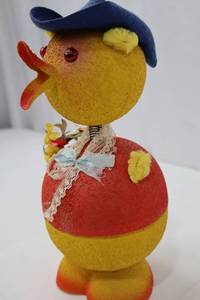 lot 23 image: Vintage West German Easter Duck Bobblehead Candy Holder from 1950s