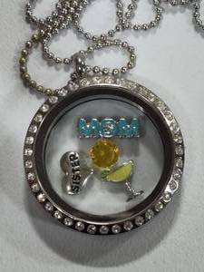 lot 56 image: Origami Owl Locket wCharms
