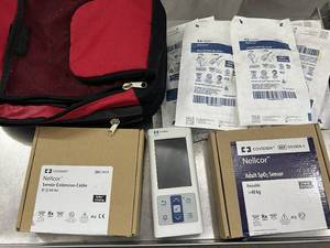 lot 17 image: MSRP $1,500 Nellcor Covidien&nbspPM10N&nbspComplete Adult SpO Monitoring Kit With&nbspOximax Technology&nbsp DS100A-1 Sensor, Extension Cable, Monitor, 8 NEW Sealed NeonatalAdult SpO Sensors  Carry Bag - Like New Working Condition