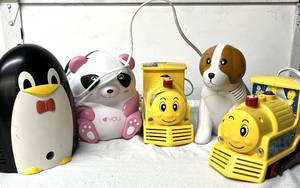 lot 101 image: Lot of Mixed Brand Animals and Toy Trains Pediatric Compressor Nebulizers (MedQuip Inc. &amp AeroFlow Healthcare) - Great Condition