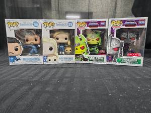 lot 31 image: 4 Pop Mister Fantastic Skeletor Shredder Invisible Woman