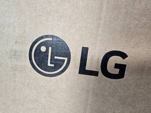 lot 61 image: LG 29 in. Laundry Pedestal in Graphite Steel with Storage Drawer for Washers and Dryers