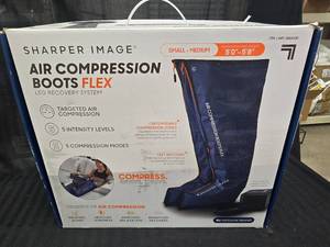 lot 79 image: Sharper Image Compression Boots Sz SM - MED 50 - 58
