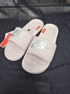 lot 84 image: New Nike Victori Barely Rose Slide Size 9