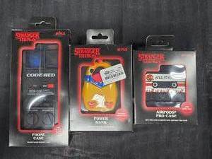 lot 127 image: Stranger Things Code Red - Hell Fire Lives- Power Bank, Airpods Pro Case and iPhone 15 Phone Case