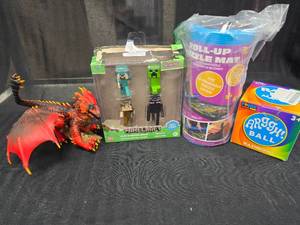 lot 148 image: Misc. Toys, Roll up Puzzle Mat Dragon Missing one Wing