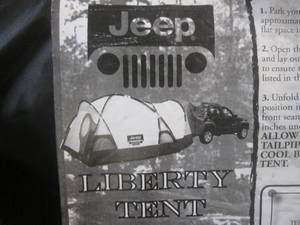 lot 131 image: (G-1) Jeep Liberty Tent...