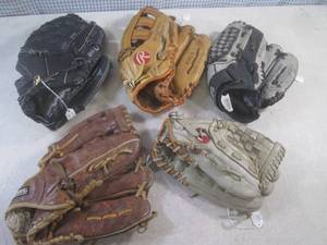 lot 91 image: (EW5) 5 Assoorted Baseball Gloves...